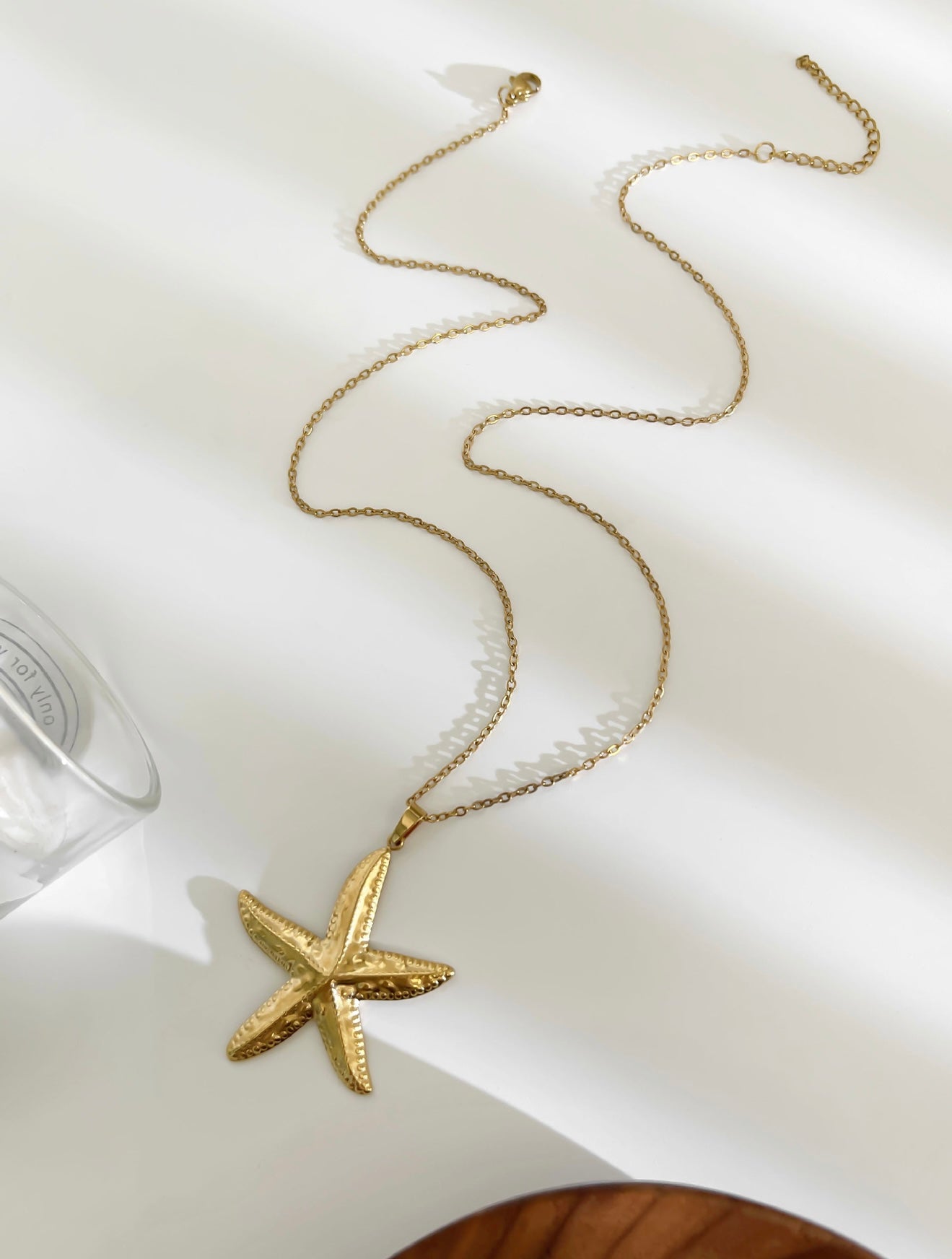 Gold starfish necklace