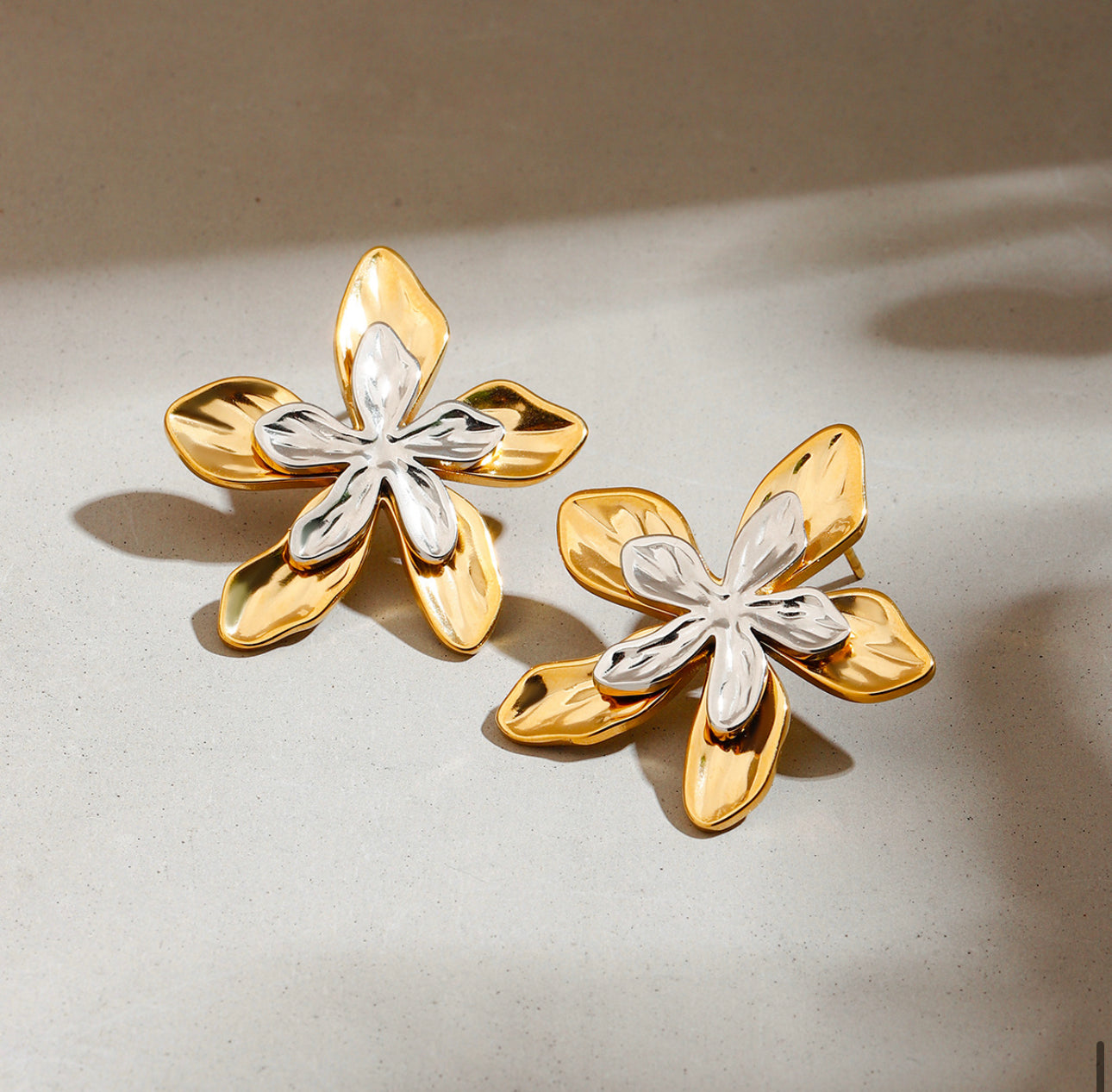 Gold and silver flower earrings