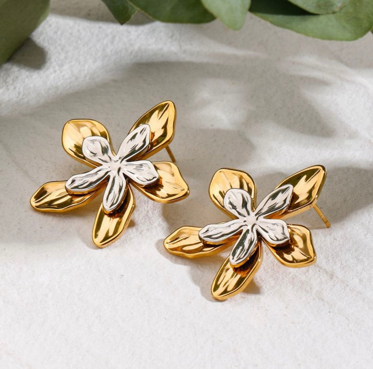 Gold and silver flower earrings